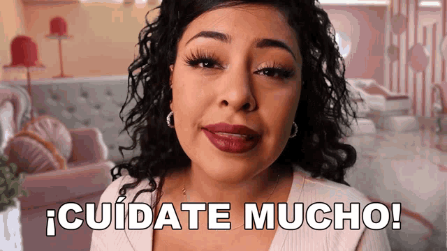 a woman with curly hair says cuidate mucho