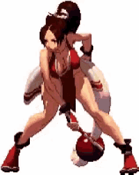 a woman in a bikini is standing next to a man in a boxing glove .