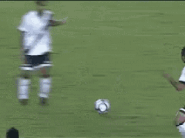 a soccer player with the number 37 on his back is kicking the ball