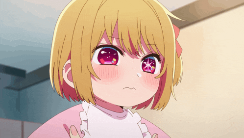 a little girl with blonde hair and red eyes looks angry