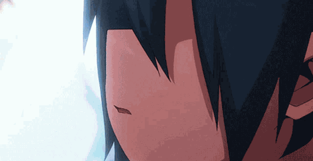 a close up of a person 's face with a tear on it
