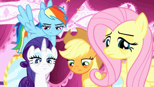 a group of ponies including rainbow dash and fluttershy are standing together