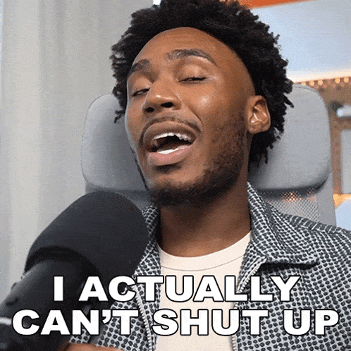 a man singing into a microphone with the words " i actually can 't shut up " below him