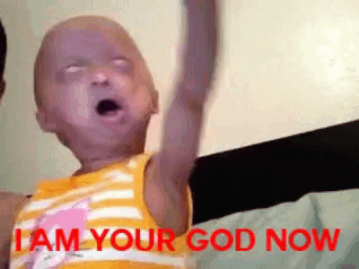 a little girl with a yellow shirt that says i am your god now on it