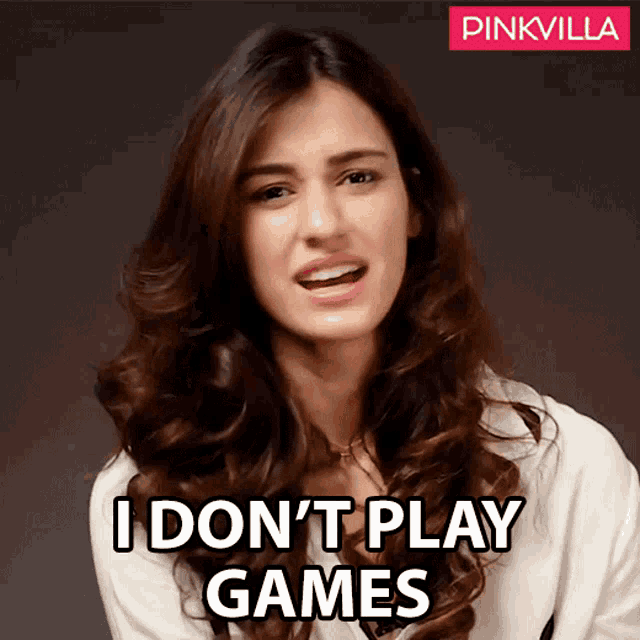 a woman says i do n't play games in front of a pinkvilla banner