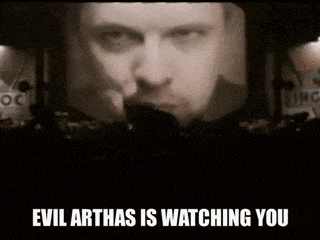 a black and white photo of a man with the words `` evil arthas is watching you '' .