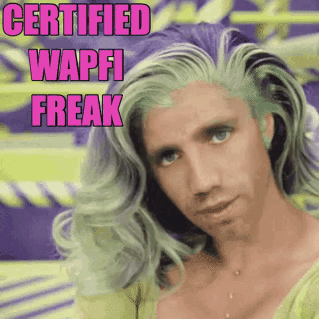 a man with green and purple hair has the words " certified wapfi freak " above him
