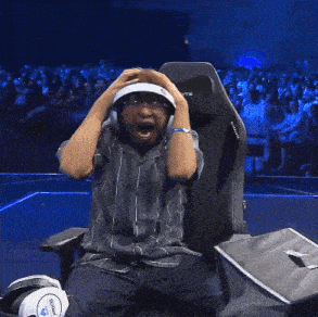 a man is sitting in a chair that says blackly on the back