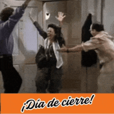 a group of people are dancing in front of a door with the words dia de cierre in the corner .