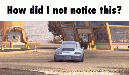 a car is driving down a road with the words " how did i not notice this " above it