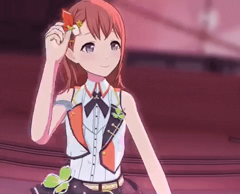 a girl is holding a flower in her hair and smiling .