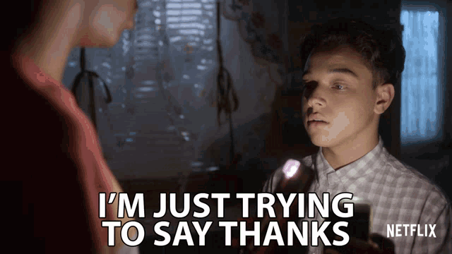 a netflix ad shows a boy holding a flashlight and saying i 'm just trying to say thanks