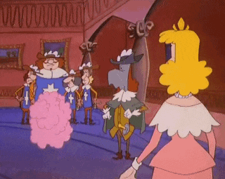 a woman in a pink dress stands in front of a group of men