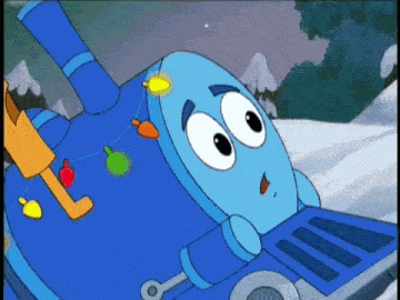 a blue cartoon character is laying in the snow with christmas lights on it 's chest .