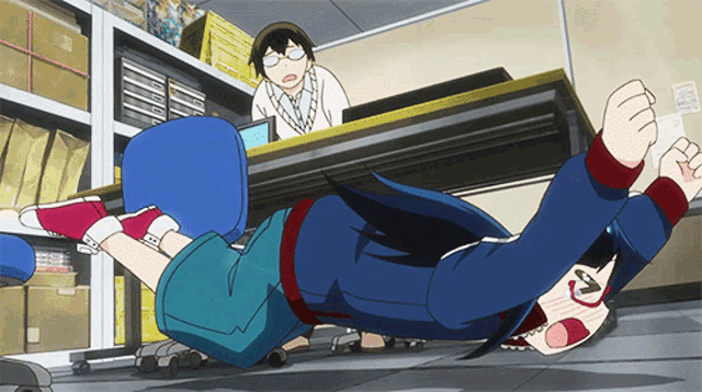 a person is laying on their back on the floor while a woman looks on