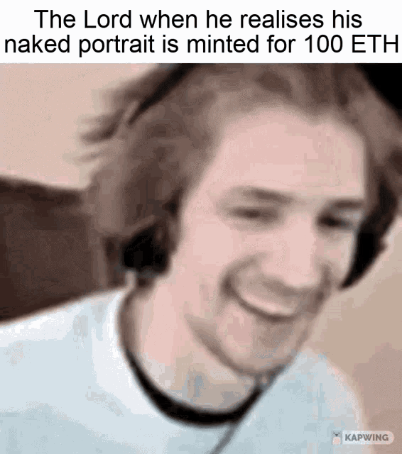 a man wearing headphones and a white shirt is smiling .
