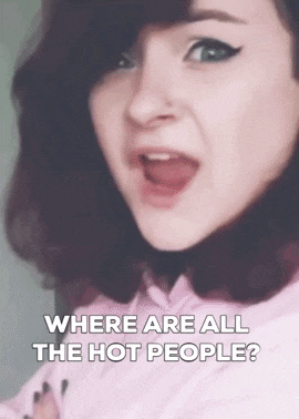 a close up of a woman 's face with the words `` where are all the hot people ? '' written on it .