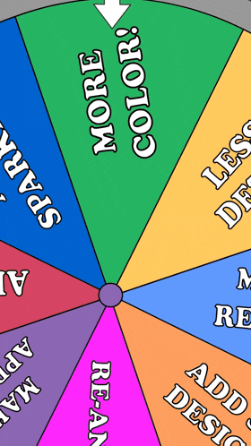 a colorful spinning wheel with a green arrow pointing to the center