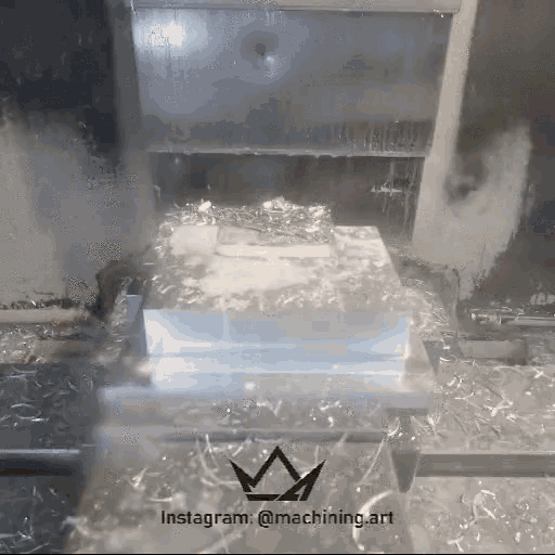 a machine is cutting a piece of metal with instagram @ machining.art written on the bottom