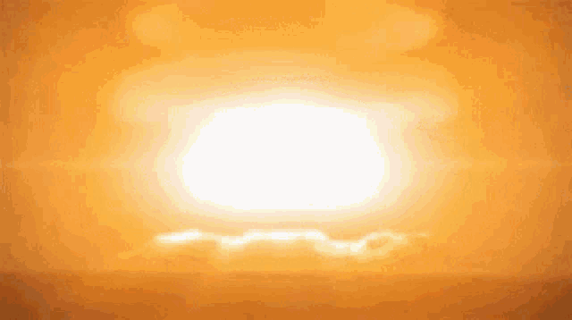 the sun is shining through the clouds in the sky .