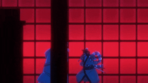 a man with a sword in his hand is standing in front of a red wall