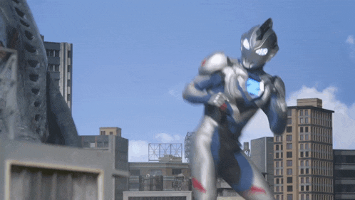 a man in a superhero costume stands in front of a city skyline