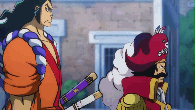a man in a red hat is holding a sword