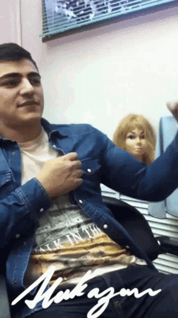 a man wearing a shirt that says ' ck intb ' on it