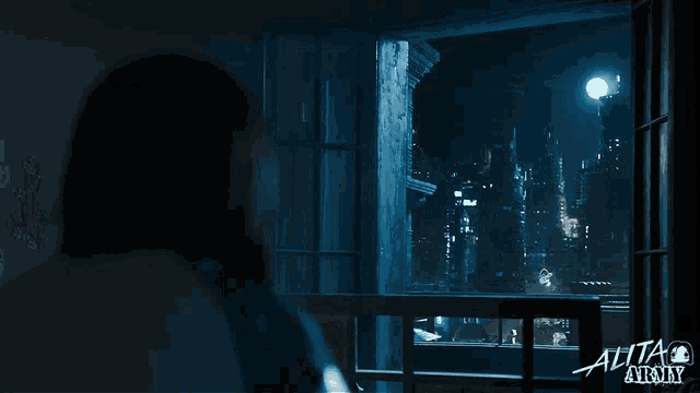 a woman looking out a window with the word alita army on the bottom right