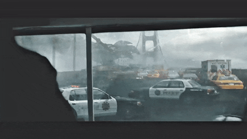 a police car is in the middle of a busy street