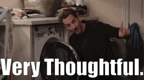 a man laying on a washing machine with the words " very thoughtful " on the bottom