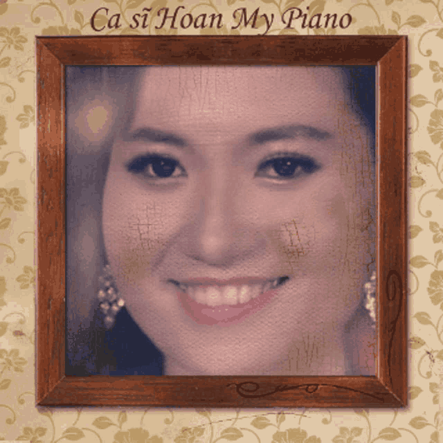 a picture of a woman in a wooden frame with ca si hoan my piano written below it