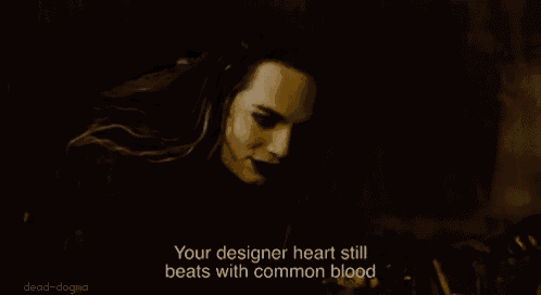 a painting of a woman with the words " your designer heart still beats with common blood " below her