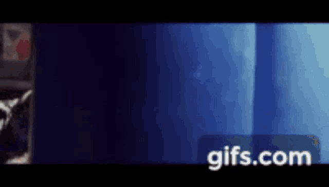 a blue background with a gifs.com logo on the bottom