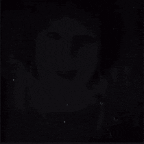a black and white photo of a woman with her mouth open