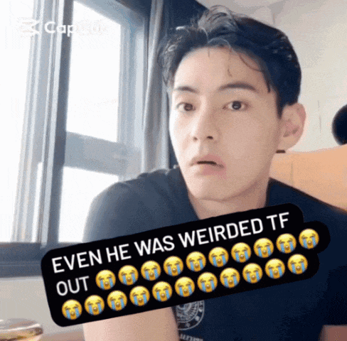 a man with a sticker that says even he was weirded tf out