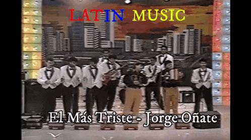 latin music el mas triste - jorge onate is being performed by a band