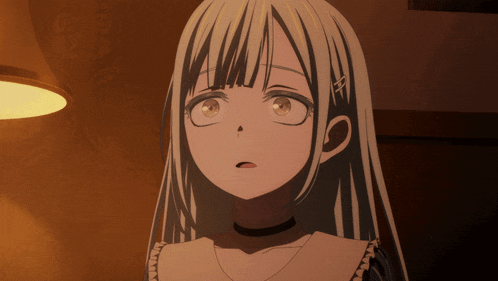 a close up of a girl 's face with a choker on her neck