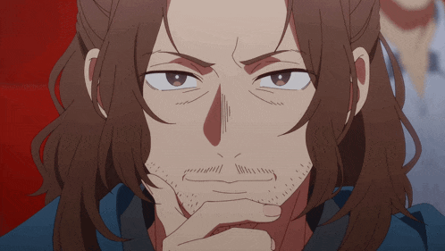 a man with long hair and a beard is thinking