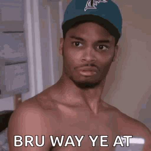 a shirtless man wearing a blue baseball cap is making a funny face and saying bru way ye at .