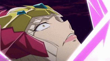 a close up of a cartoon character 's face with a pink light coming out of her mouth