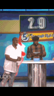 a man is standing in front of a sign that says 2.9 second rule
