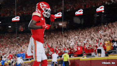 a football player wearing a helmet with a chiefs logo