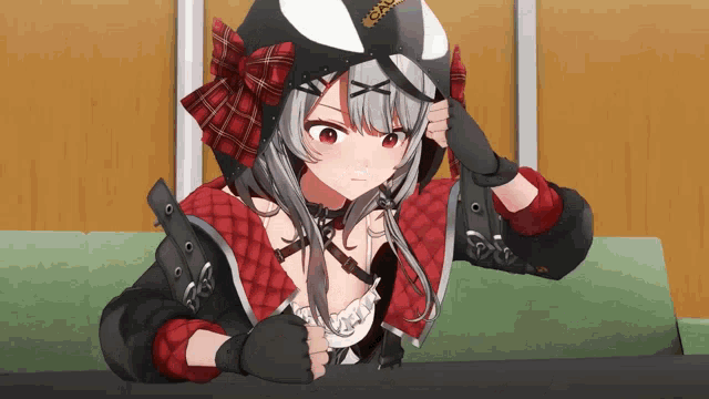 a girl with a helmet on her head is sitting on a chair