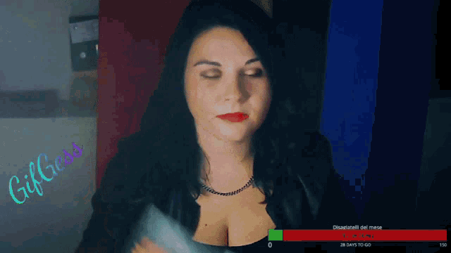 a woman 's face is displayed on a screen with the words self goddess written on it