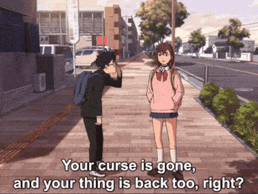 a boy and a girl are standing on a sidewalk and the girl says " your curse is gone and your thing is back too "