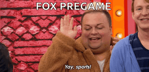 a man in a robe says yay sports