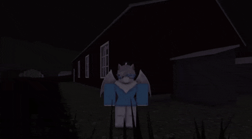 a blurry picture of a person with a crown on their head in a dark room .