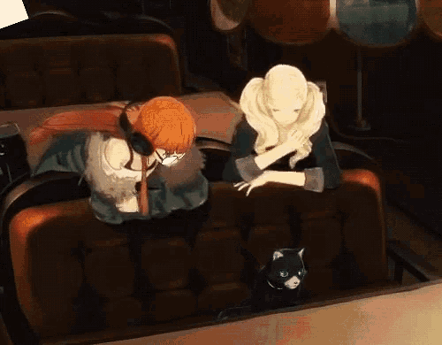 a couple of anime characters sitting on a couch with a cat in the background