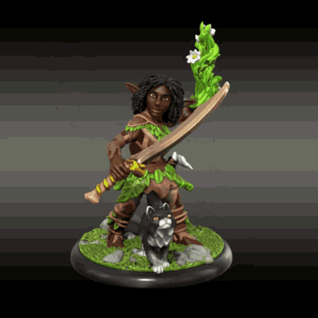 a statue of a woman holding a sword and a black cat